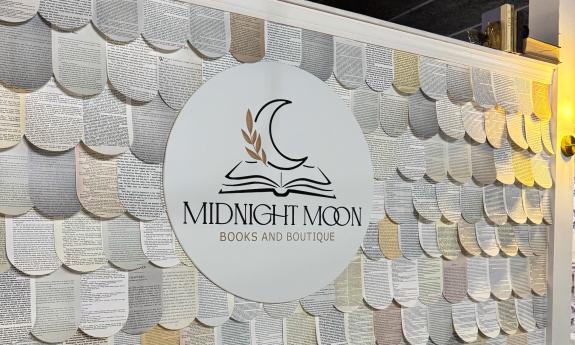 The Midnight Moon Books & Boutique counter sign