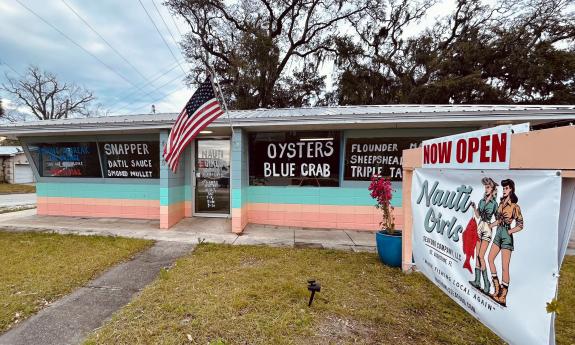 The exterior of Nauti Girls Seafood Company