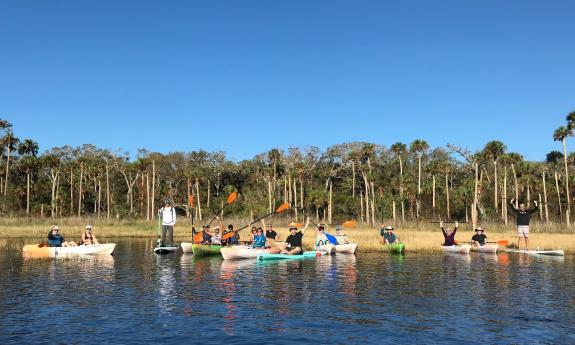 A group of kayakers near an inland beach in northeast Florida