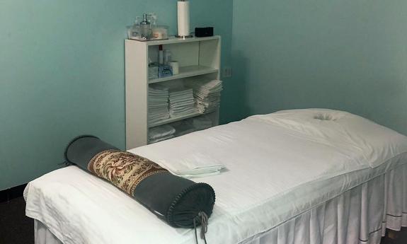 A bed cot used in one of the massage rooms
