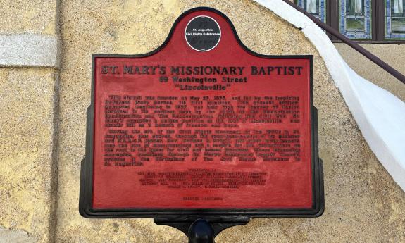 The historic marker in front of the church