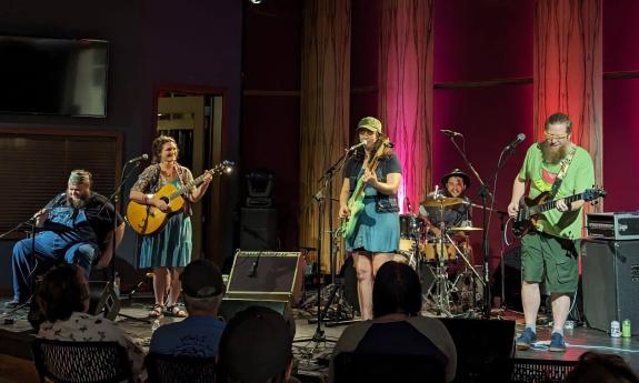 The band performing a live set