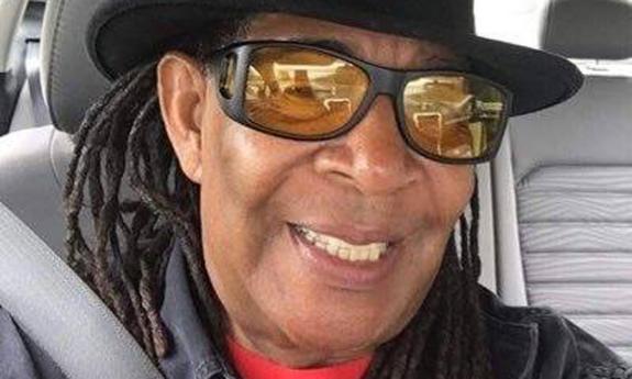 Blues artist Gitlo Lee in sunglasses, smiling