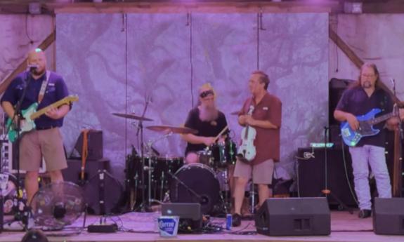 The band Muhly onstage at Colonial Oak Music Park