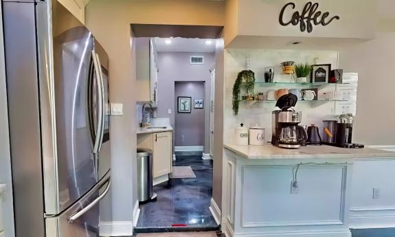A look from the coffee station to the bulter's pantry at a local vacation rental