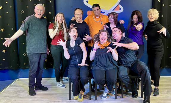 The Improv Spooktacular cast on the stage