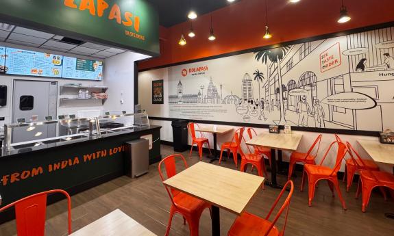 The indoor dining area of Kolapasi Indian Canteen