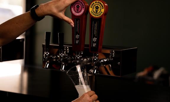 A server pouring a drink