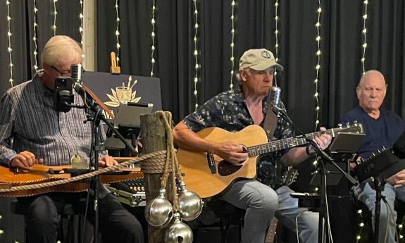 JC Hatfield Trio onstage at Kava & Canvas Lounge