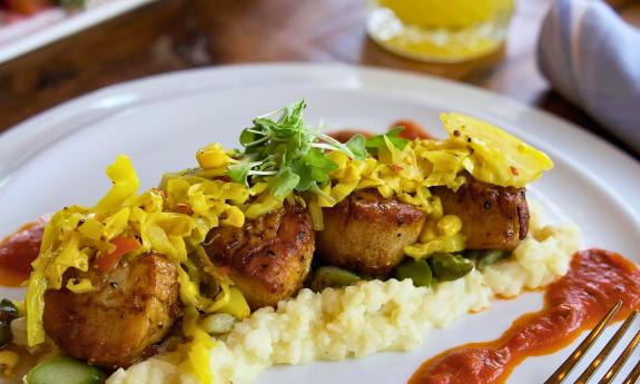 Scallops prepared for dinner at River & Fort
