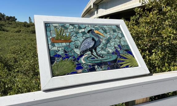One of the colorful bird mosaics
