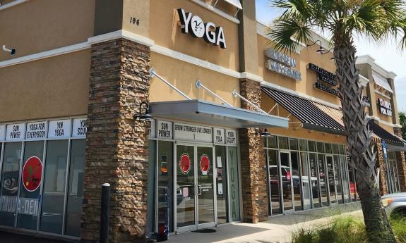 The exterior of Yoga Den in World Golf Village