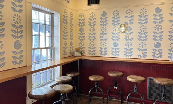 The indoor seating area overlooking Hypolita Street