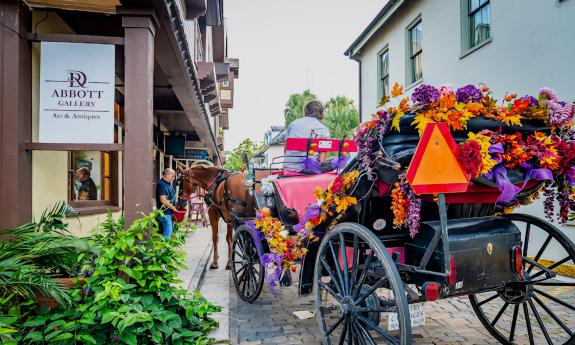 A horse and carriage outside the gallery's storefront