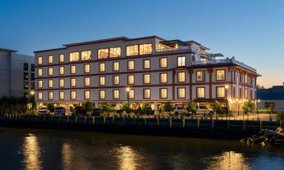 The exterior of Hotel Amalga along the marina