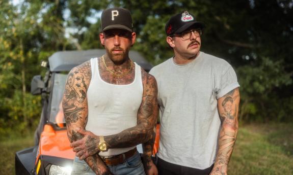Luke Healy and Jesse Denaro, the duo Lakeview, outside with a four-wheeler