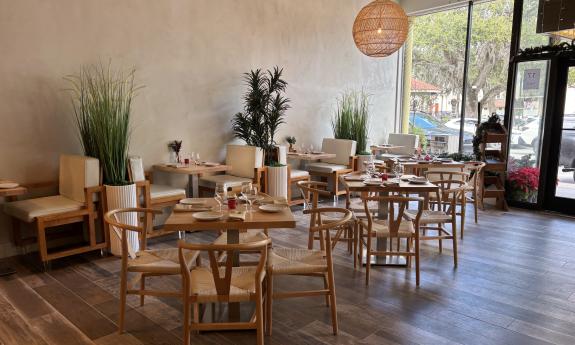 Tables and booths used for indoor dining