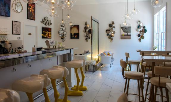 Duck-themed couches and tables inside the bar