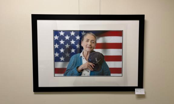 A photo, entitled "Elena," honoring a American woman veteran