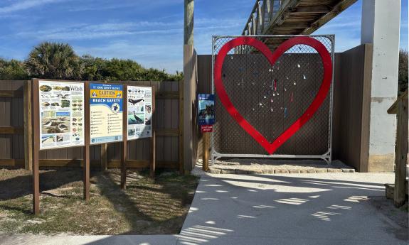 The lock bridge wall and an ocean information display