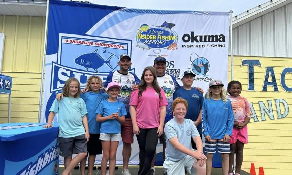 Youth participants in an onshore fishing tournament hosted by Fishbites Trading Post