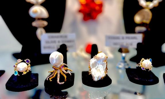 Four artistic rings created from pearls