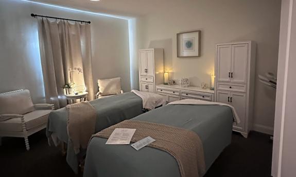 two beds in a private room at the Spa at Palaencia