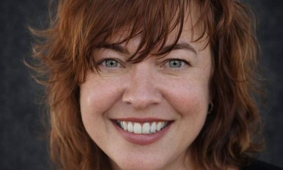 headshot of composer/pianist/vocalist Jenia