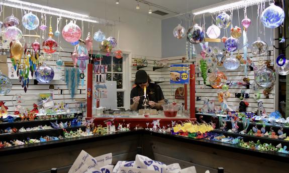 A live glassblowing demonstration inside the shop