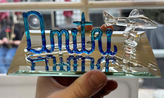 A personalized glass name sign