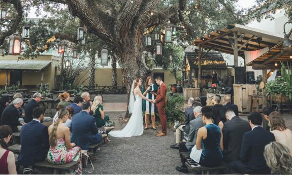 A wedding ceremony under the Oak at Colonial Oak Events