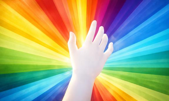 Rainbow rays radiating out from the center with a white hand raissed