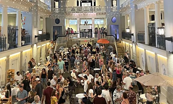 People attending the Lightner Pool Party to view local crafts and arts