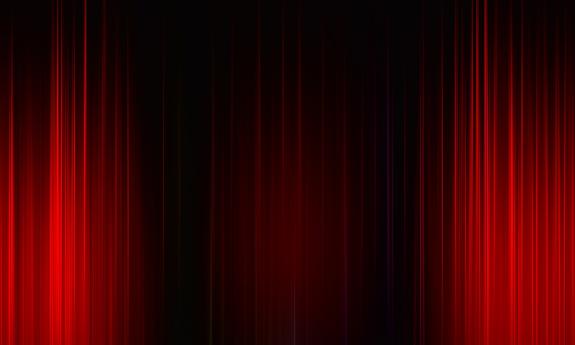 Red curtain on a black stage