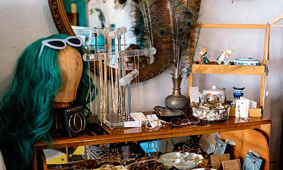 Accessories from wigs to earing trays at a vintage shop