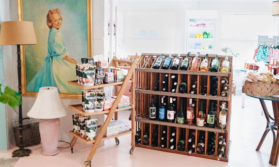 The wine display at a local bodega offers snack items as well