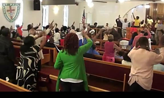 Congregants at St. Paul AME Church singing