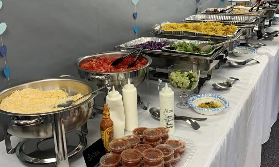 The Three Moons catering layout at an event