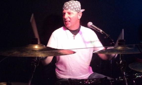 Frankie Urzetta playing his drums and singing
