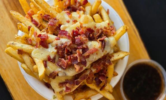 Cheese and bacon fries served at Epik Burger