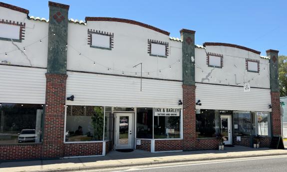 The exterior of the tattoo studio and bar