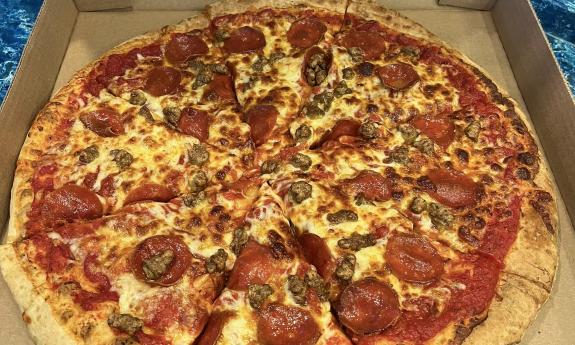 A pepperoni and sausage pizza
