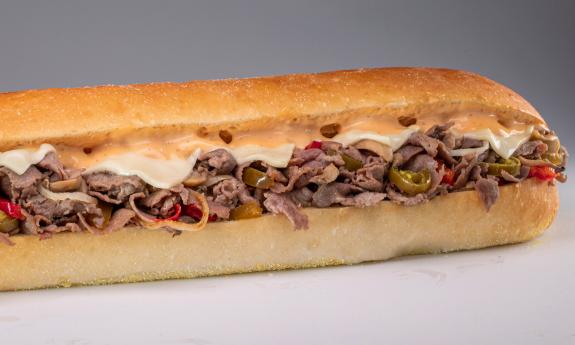A close up of a Philly cheese steak