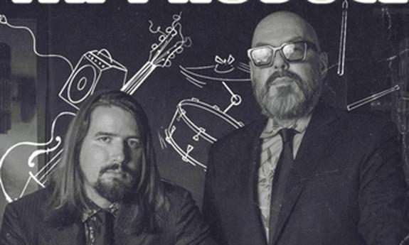 Jazz sould duo Fat Produce standing together on stage. 