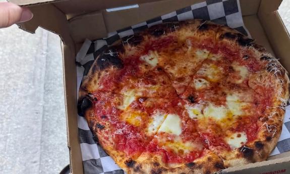 A cheese pizza served at the eatery