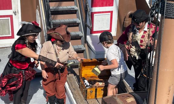 A birthday boy opens his treasure chest on the Black Raven