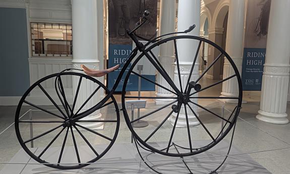 An antique bicyle in the "Riding High" display at Lightner Museum