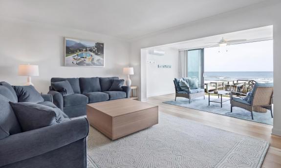 A living room expanding into an outdoor patio