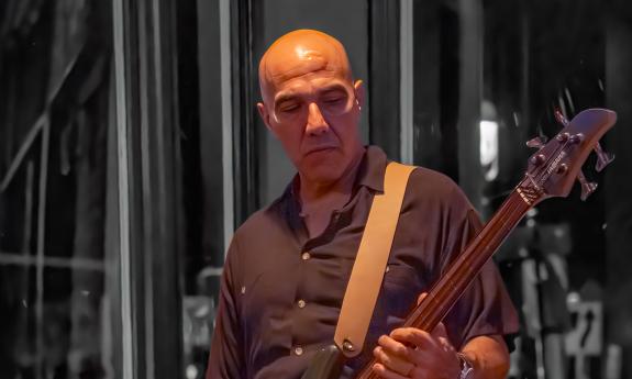 Bassist for House Cats band, Joe Segal performing. 
