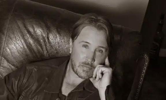 Singer/songwriter Lance Miller looking at camera.